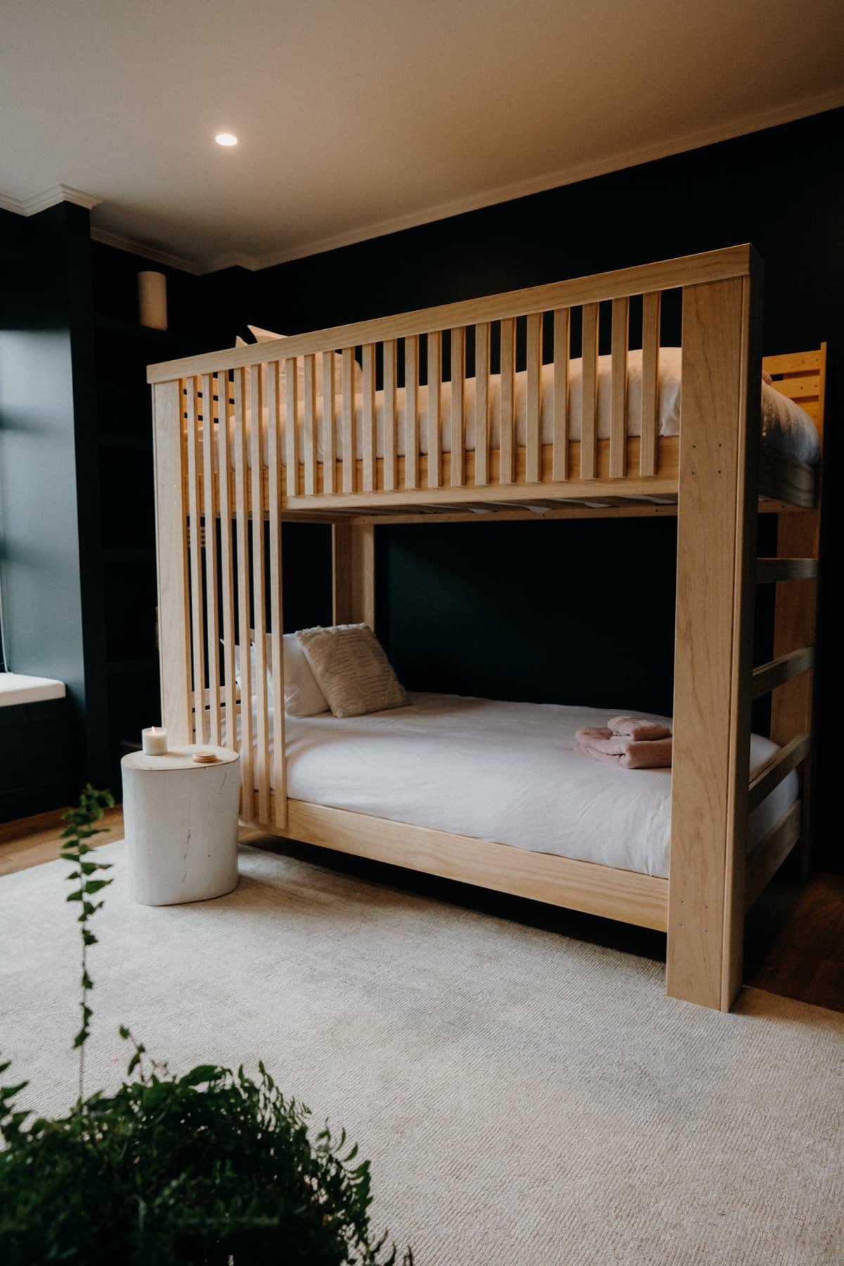 The Maori Bay Room at Kula Muriwai, king single bunk beds and a bay-window nook