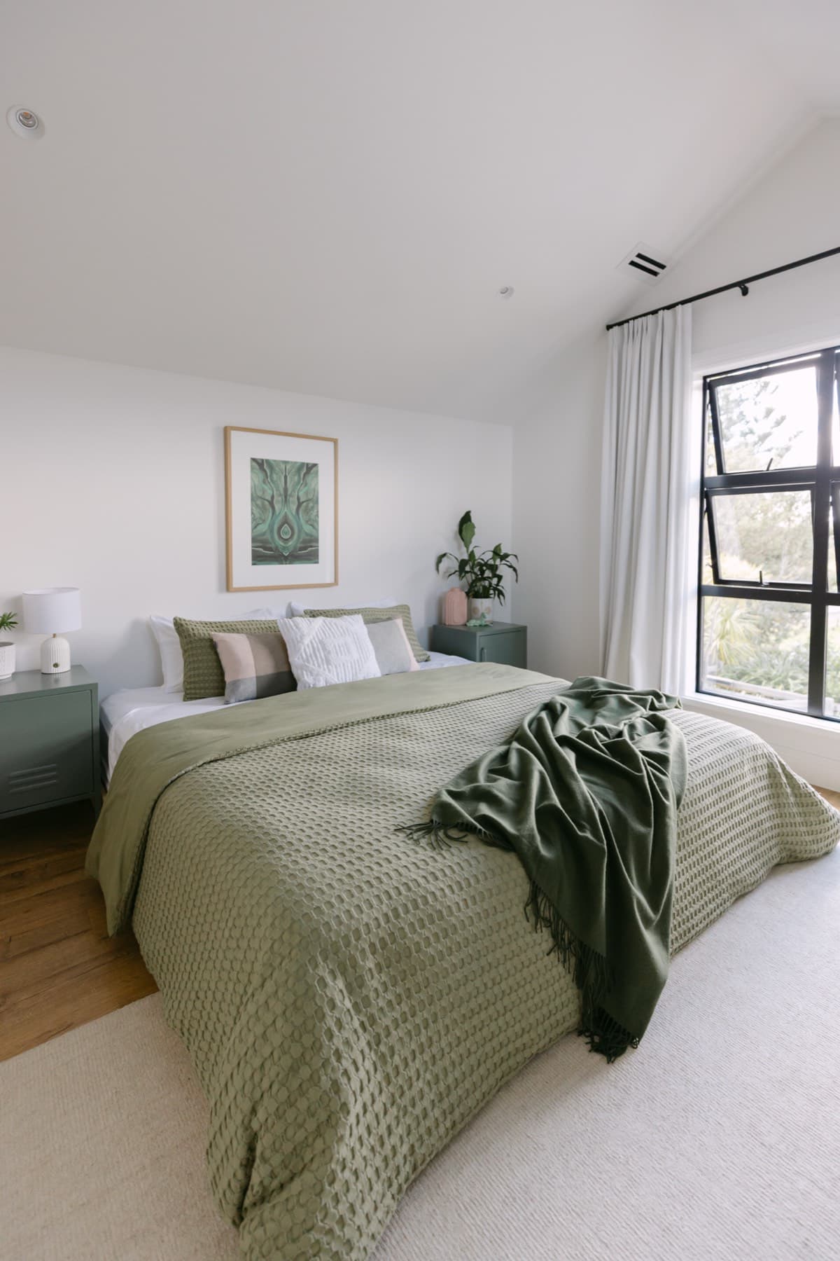 The Te Waharoa Bay Room at Kula Muriwai, configurable super king or twin beds with a private bathroom