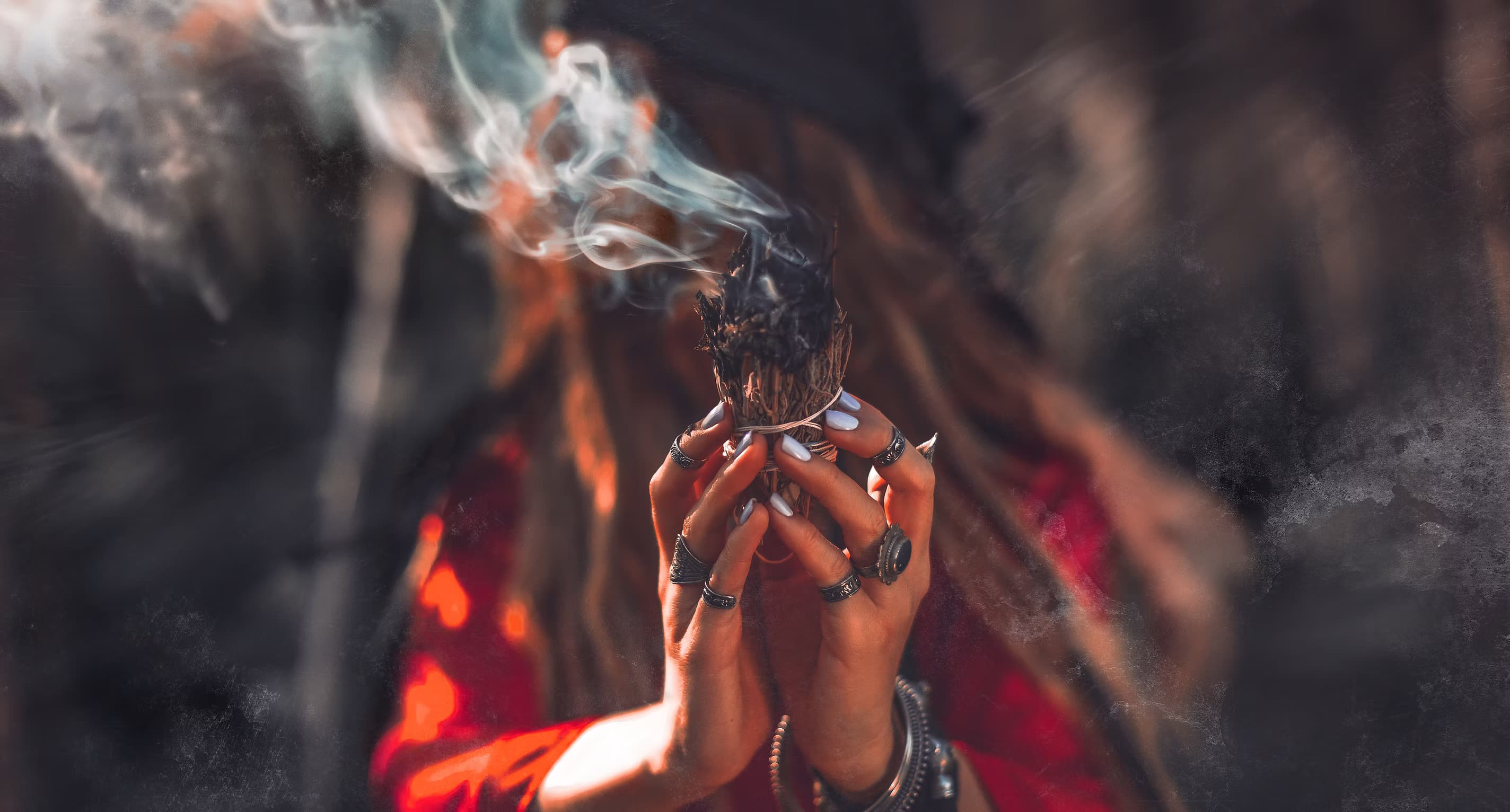 Smudging ritual smoke rising