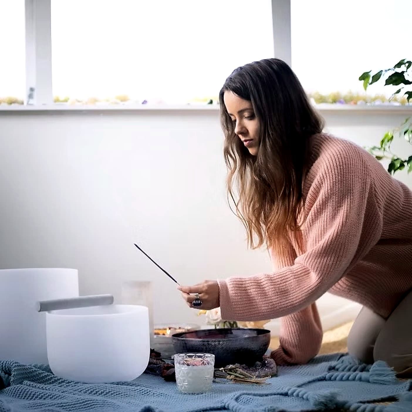 Sophia preparing ceremony with incense